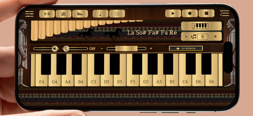 Interfaz de la aplicación Pan Flute Sim mostrando una flauta de pan virtual y un teclado musical en un smartphone.