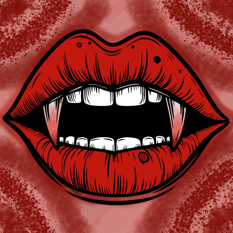 lips with vampire teeth