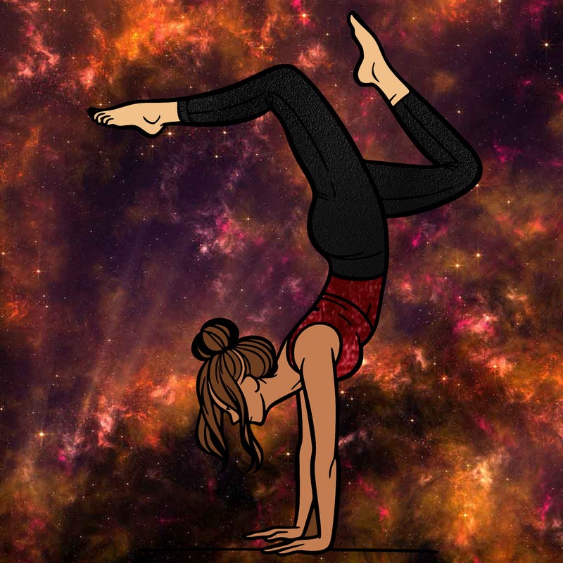 a woman doing a handstand