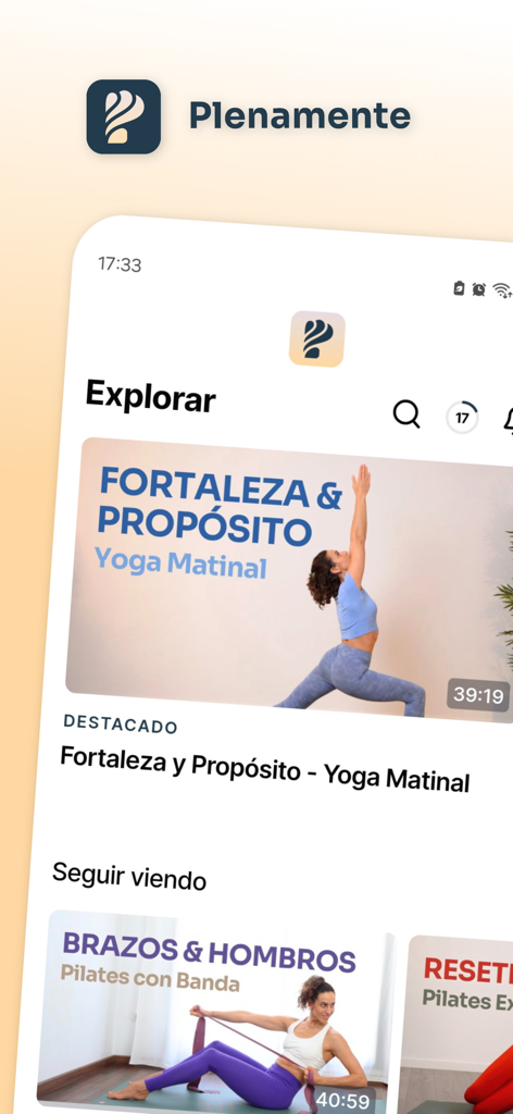 Explore screen of the Plenamente app displaying yoga and pilates video classes