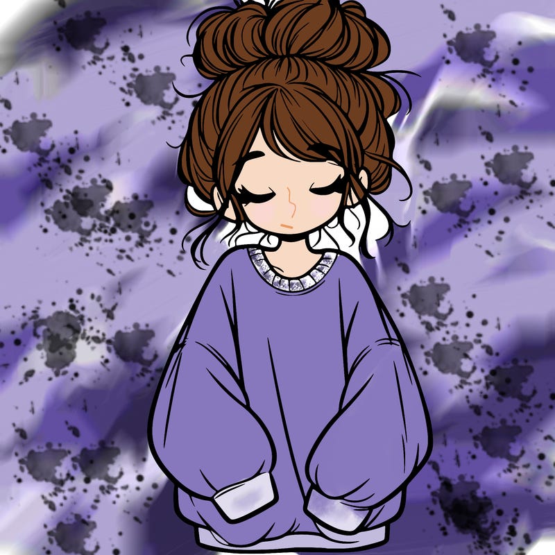 girl with baggy sweatshirt and messy bun