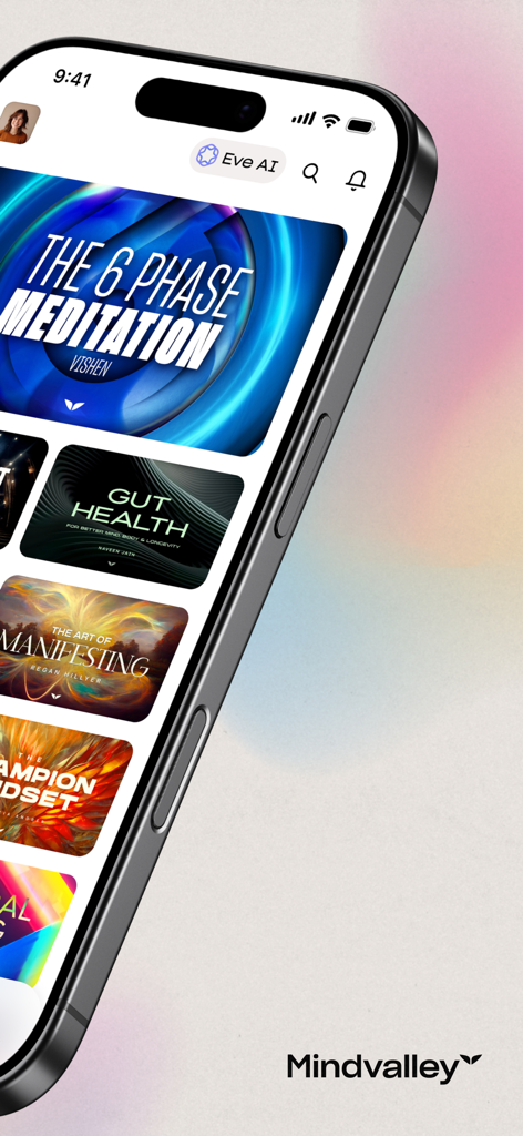 Mindvalley: Self Improvement - Smartphone screen displaying the Mindvalley app interface with self-improvement programs and meditation quests.