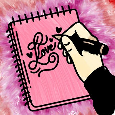 a hand writing “love” in calligraphy on a notebook
