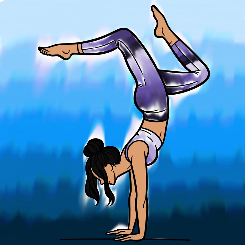 a woman doing a handstand