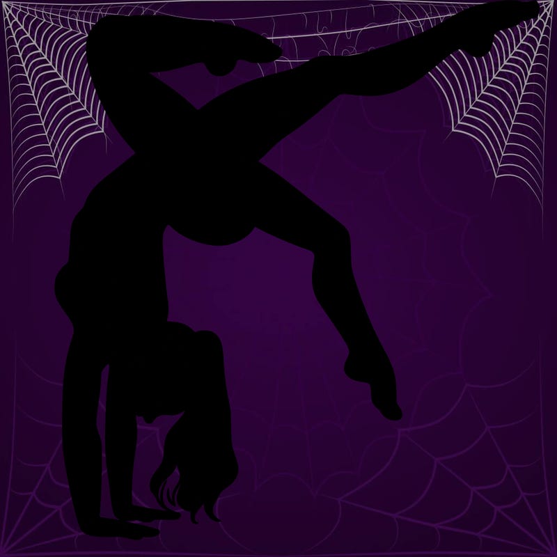 a woman doing a handstand