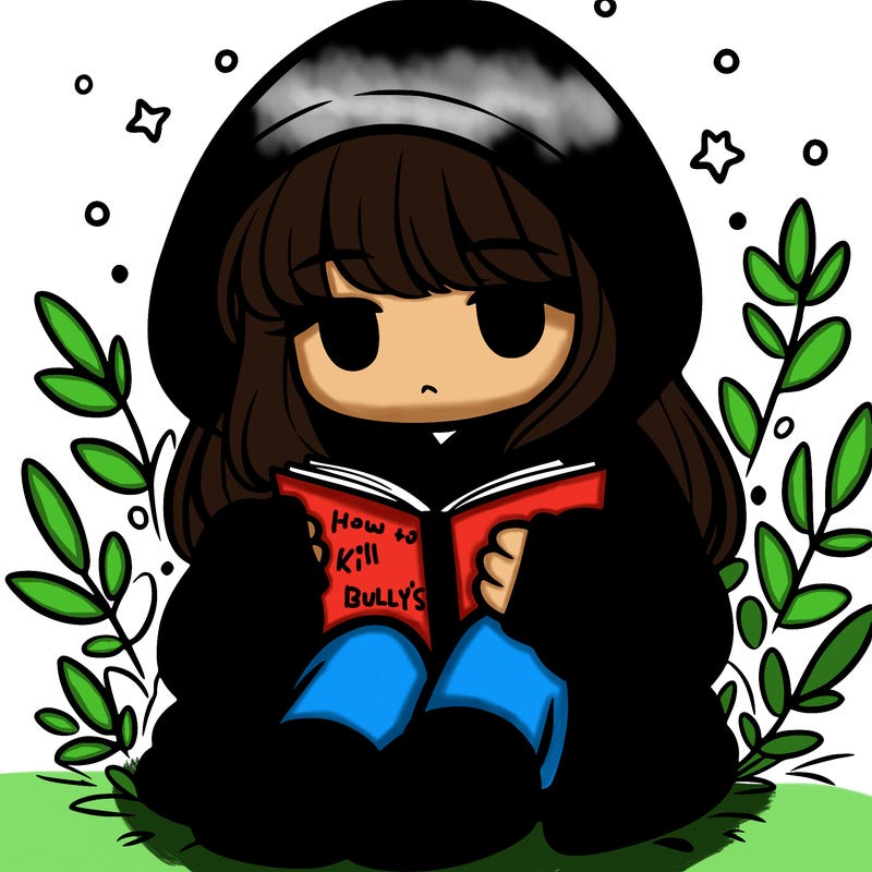 girl in oversized hoodie reading a book