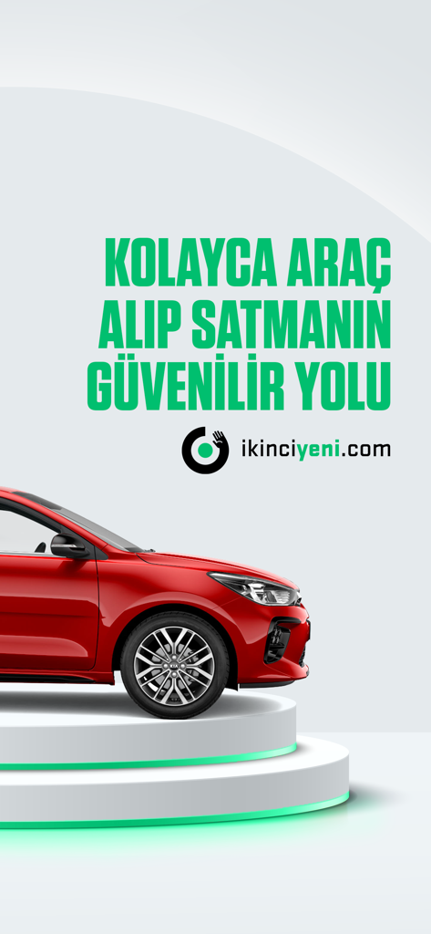 ikinciyeni.com - Une voiture rouge sur un podium d'exposition avec le logo ikinciyeni.com et un texte turc pour acheter et vendre des voitures.