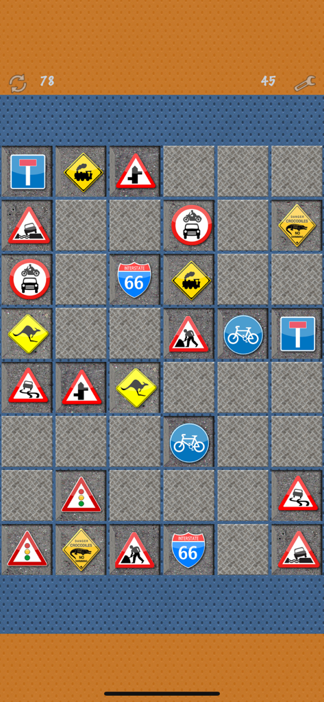 Pairs (Oh no! Another one!) - Memory matching game grid with various road sign icons