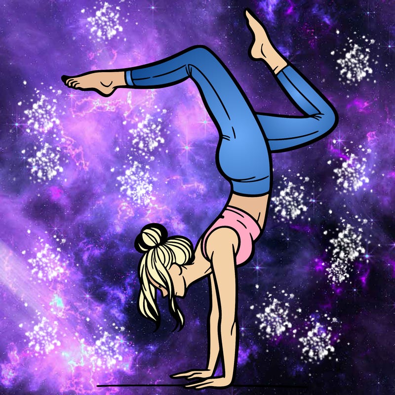 a woman doing a handstand