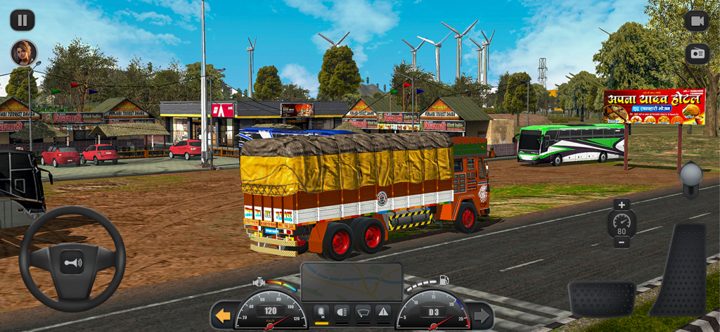 A traditional Indian truck parked next to roadside dhabas in the Truck Masters India Simulator mobile game.