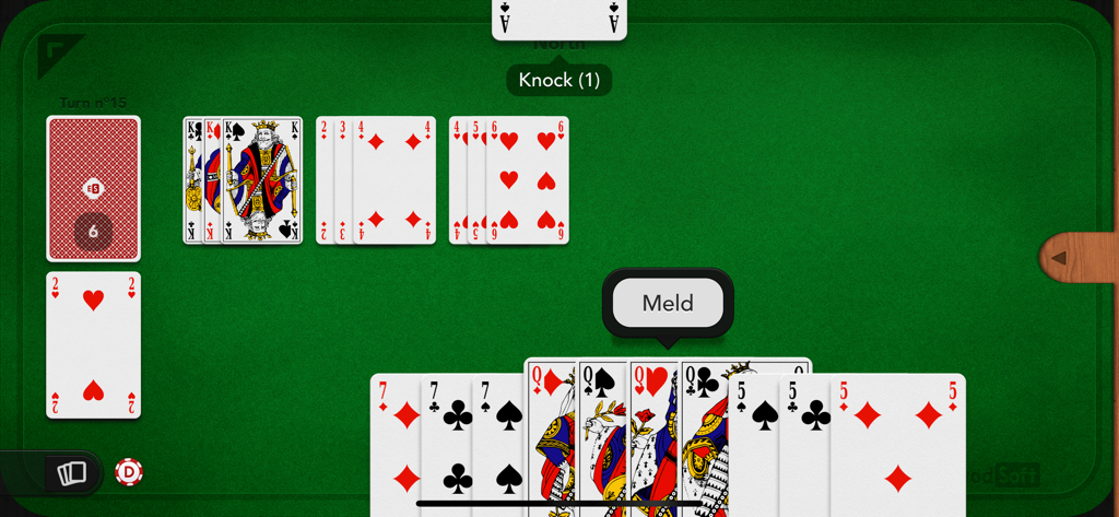 Gin Rummy - Digital Gin Rummy card game showing a hand of cards and melds on a realistic green felt table.