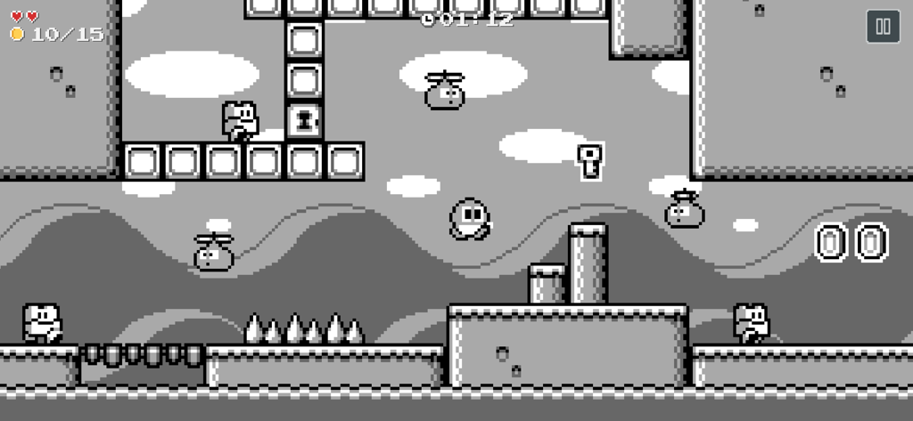 A monochrome pixel art platformer level created in the Bloxels app