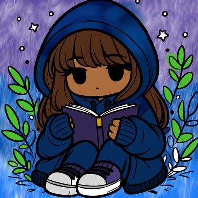 girl in oversized hoodie reading a book