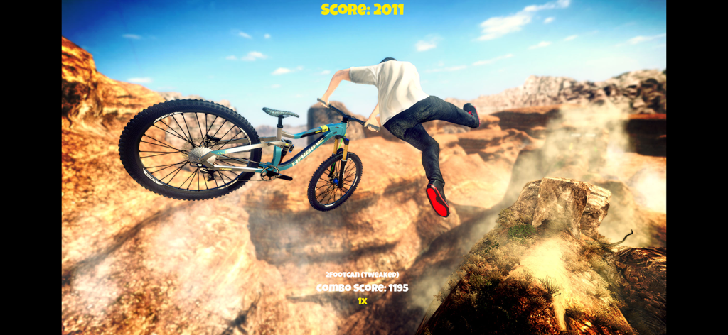 Shred! 2 - ft Sam Pilgrim 2023 - Un mountain biker esegue un trick a mezz'aria sopra un canyon desertico in Shred 2.