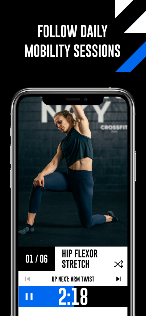 A woman performing a hip flexor stretch in the WODProof app daily mobility session