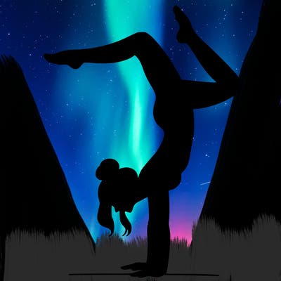 a woman doing a handstand