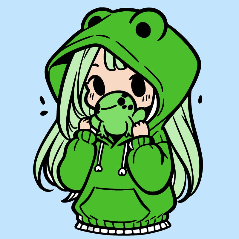 a girl holding a froggy hoodie