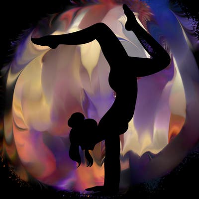 a woman doing a handstand