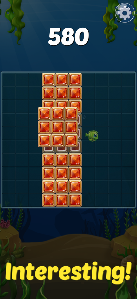 Block Ocean Puzzle 1010 - Gameplay screenshot of Block Ocean Puzzle 1010 showing orange blocks on an underwater grid with the word Interesting.