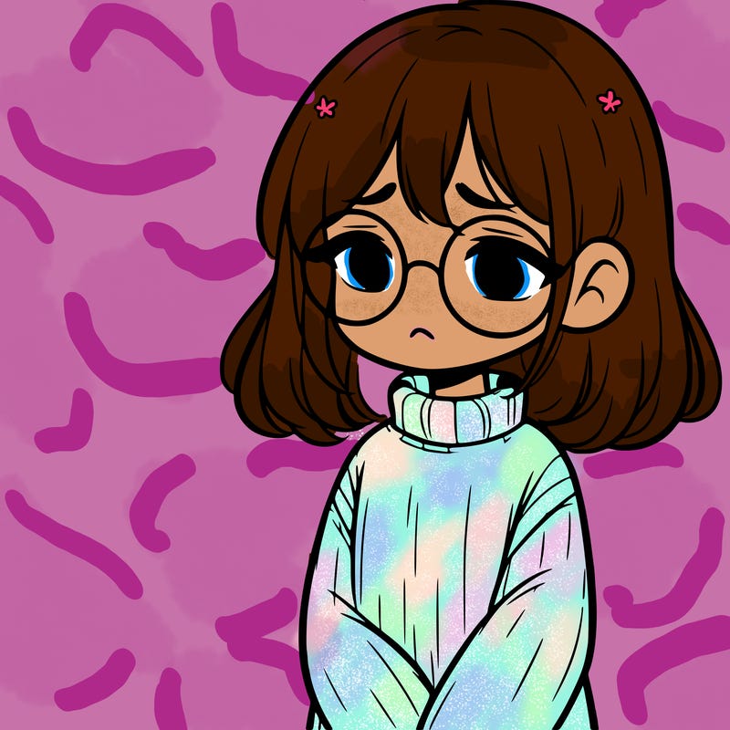 sad girl with glasses in a sweater