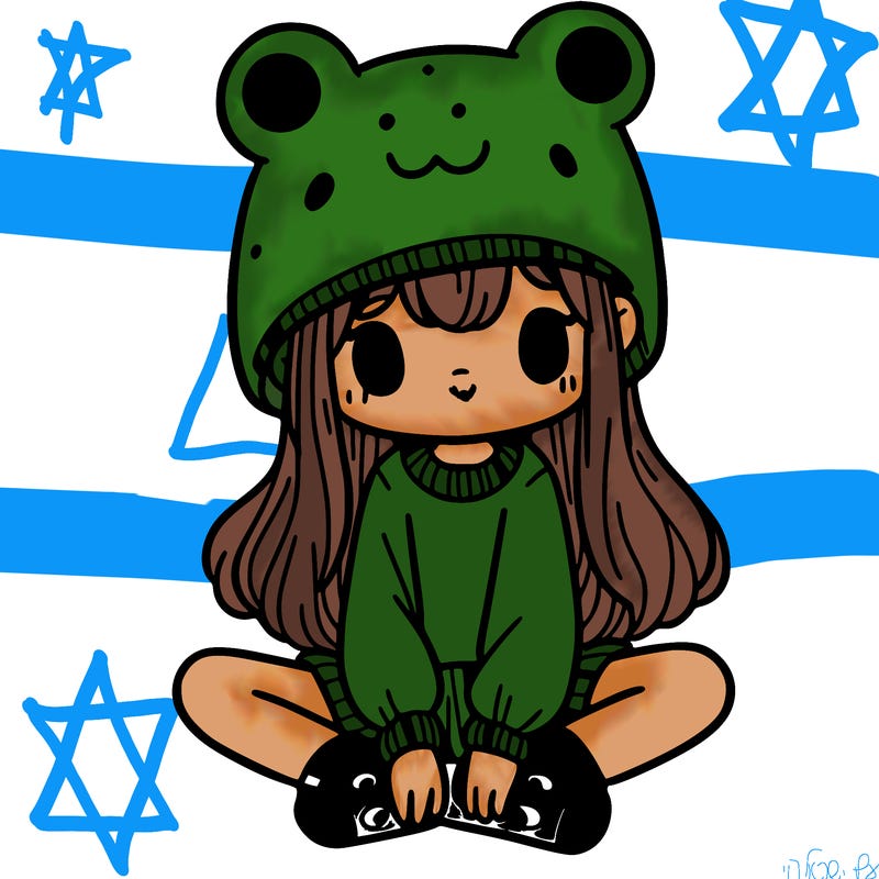 a girl wearing a frog hat and some frog socks