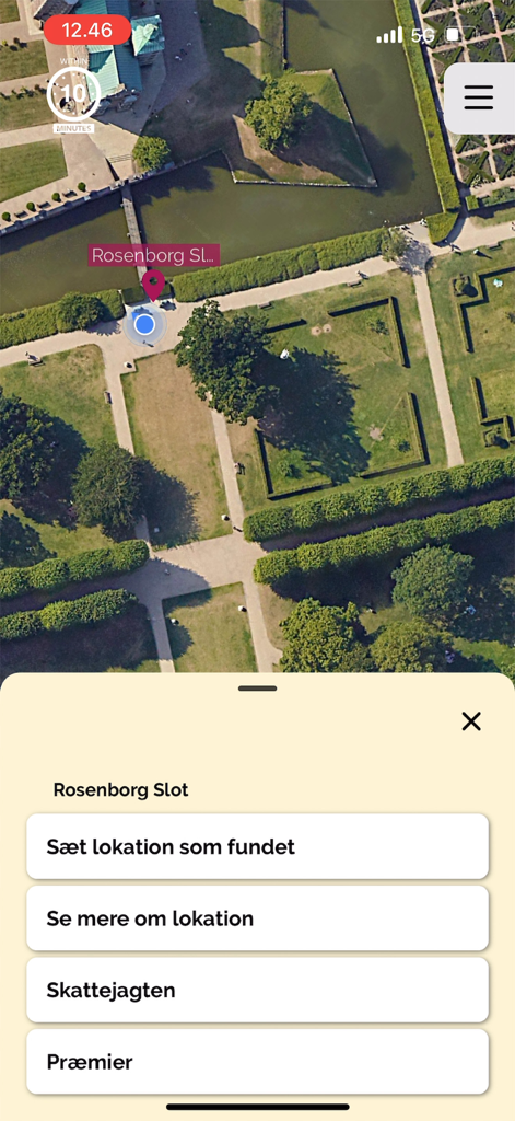 Aerial map view of Rosenborg Castle in the Copenhagen Light Festival app showing the treasure hunt interactive menu.