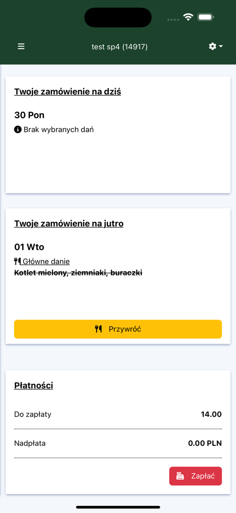 Mobile App-Oberfläche von iKuchnia mit einer geplanten Schulessensbestellung und Zahlungsdetails für das Mittagessen eines Kindes.