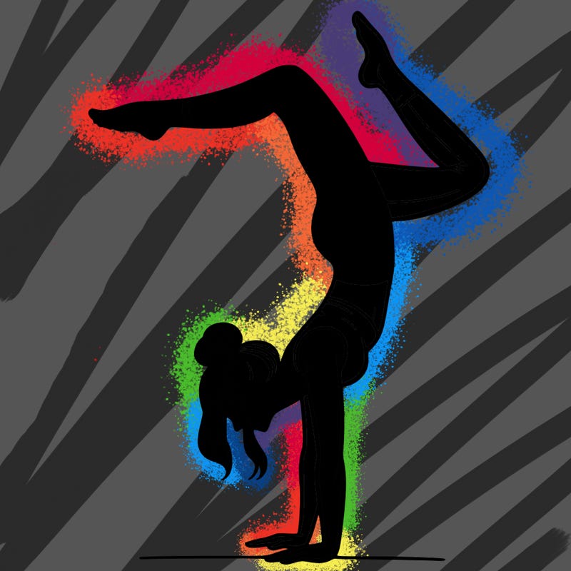 a woman doing a handstand