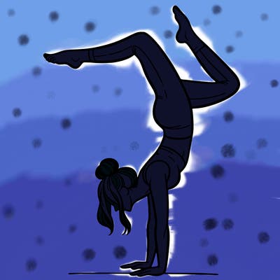 a woman doing a handstand