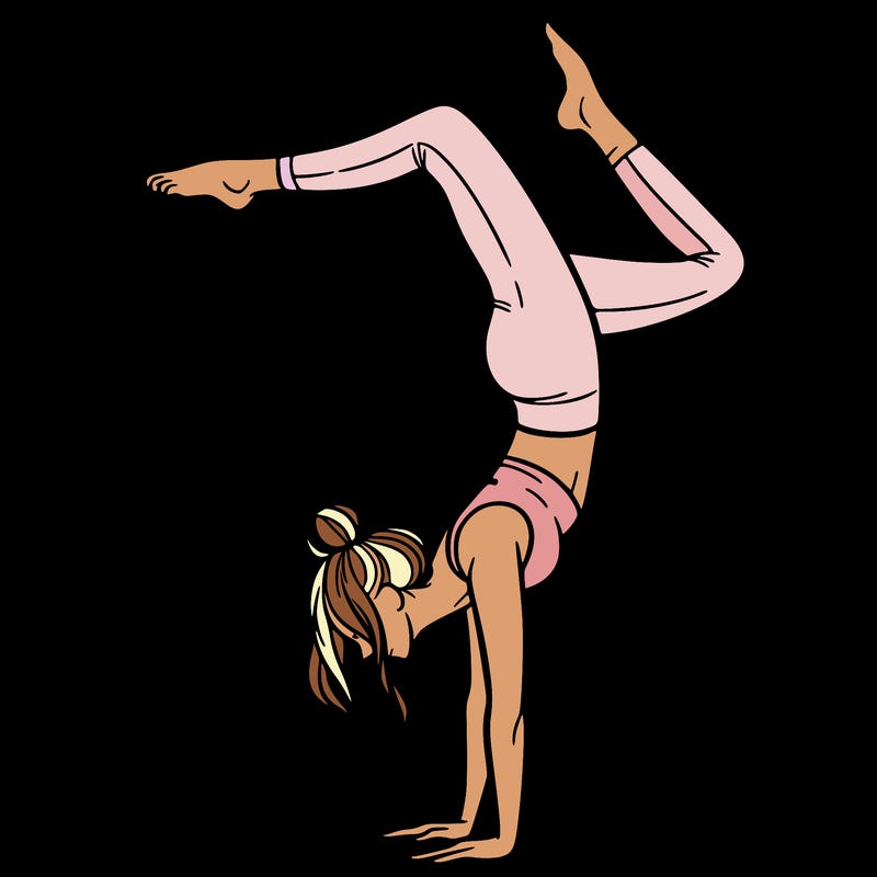 a woman doing a handstand
