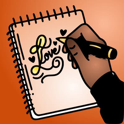 a hand writing “love” in calligraphy on a notebook