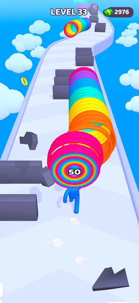 Personaje azul corriendo en una pista y recogiendo capas de arcoíris para construir un muelle