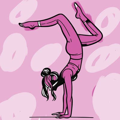 a woman doing a handstand