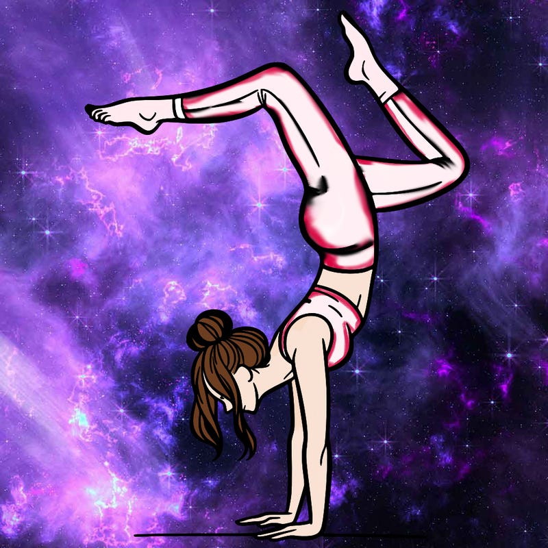 a woman doing a handstand