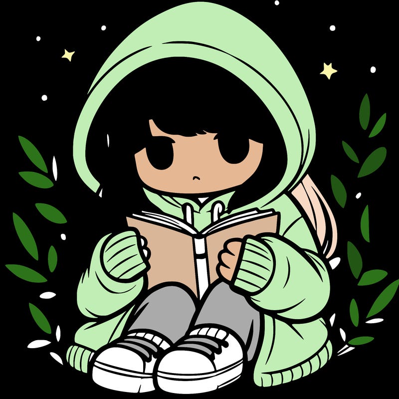 girl in oversized hoodie reading a book