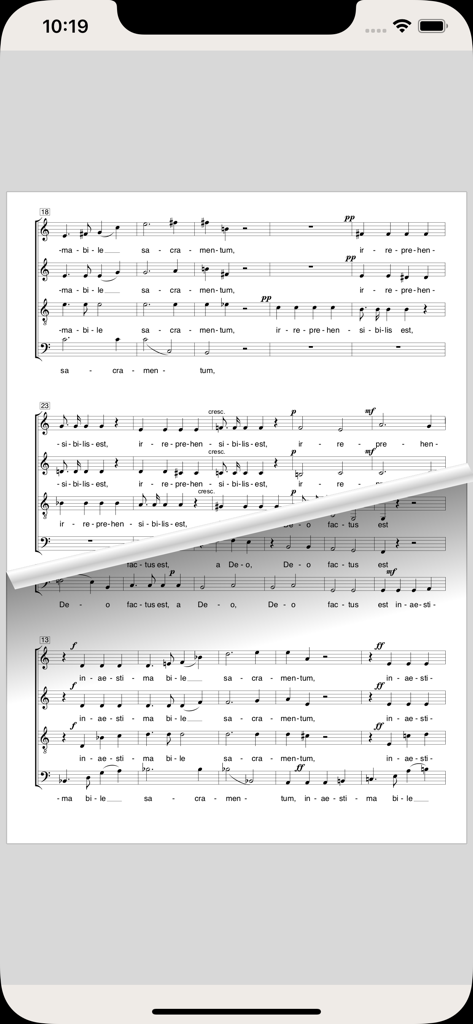 Die App capella score reader zeigt eine digitale Notenpartitur mit einem Umblätterepekt.