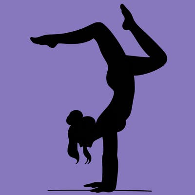 a woman doing a handstand