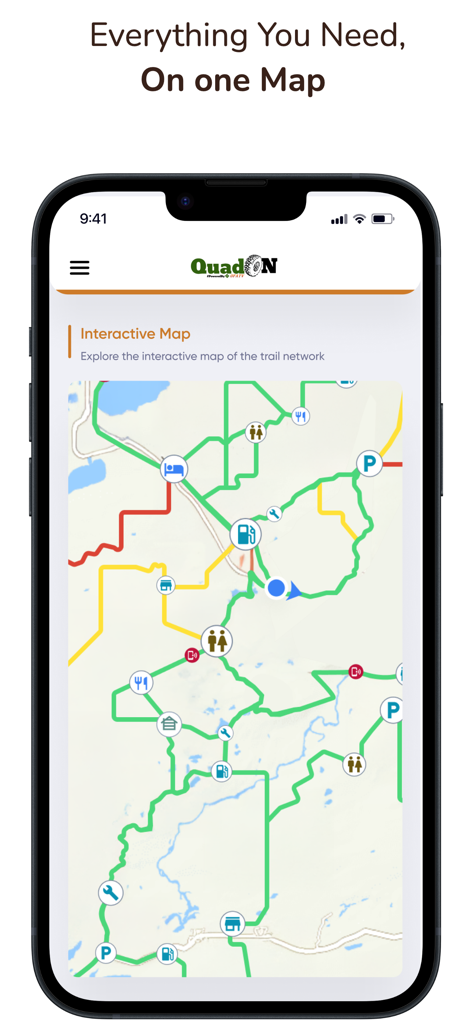 iPhone screen displaying the QuadON interactive ATV trail map with points of interest like gas stations and parking