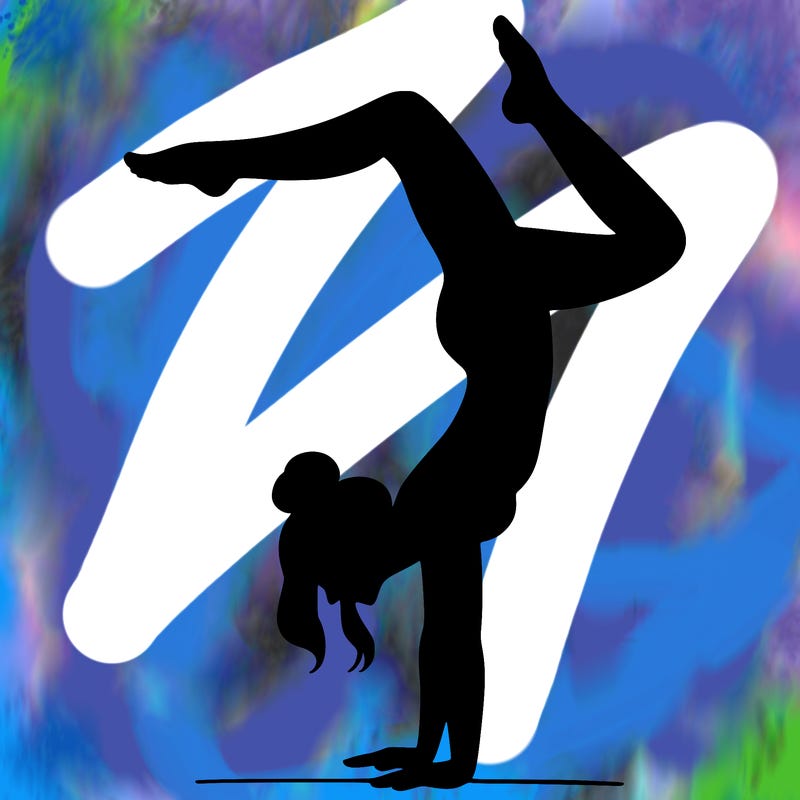 a woman doing a handstand