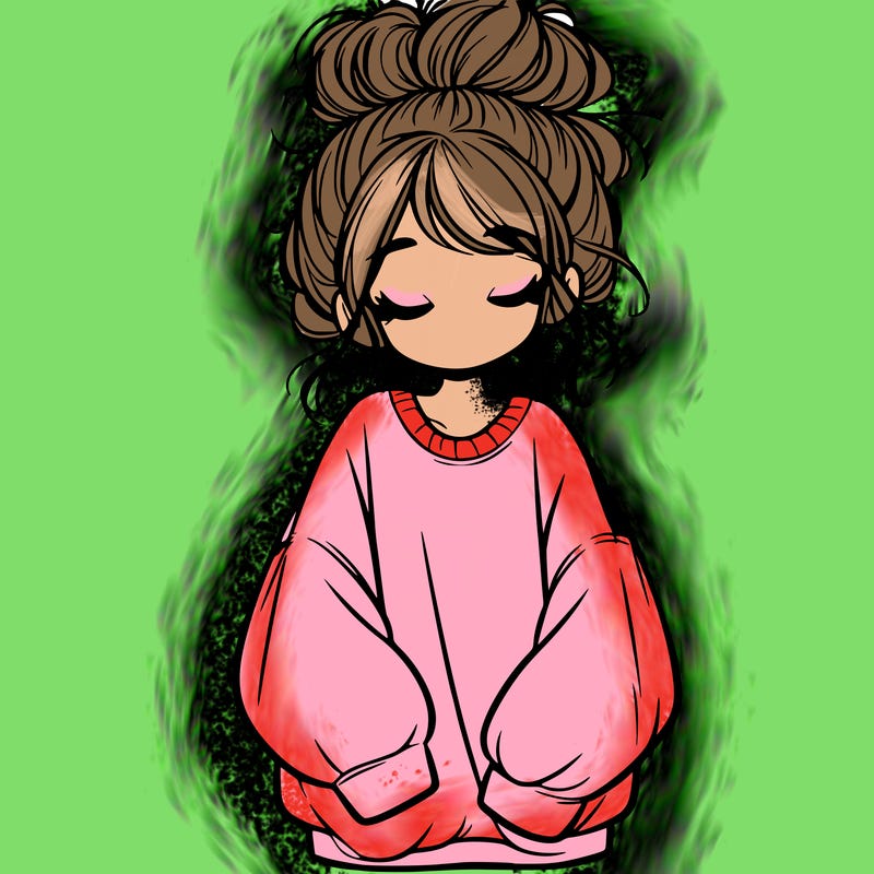 girl with baggy sweatshirt and messy bun