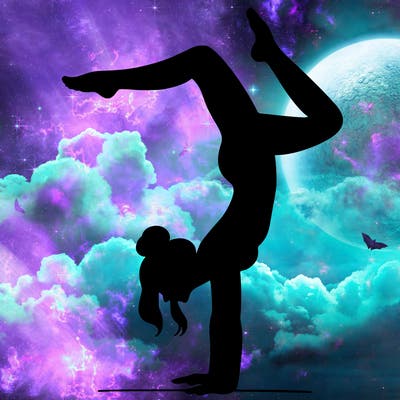 a woman doing a handstand