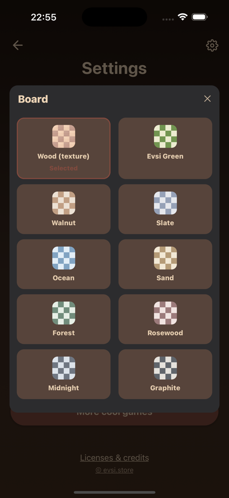 Chess Pro: vs AI & 2 Player - Pantalla de selección de temas de tablero de ajedrez personalizables que muestra madera, nogal, pizarra y otras opciones de color.