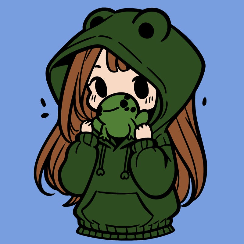 a girl holding a froggy hoodie