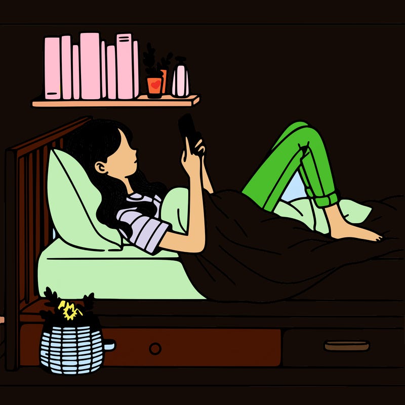 a girl laying on her bed with her phone