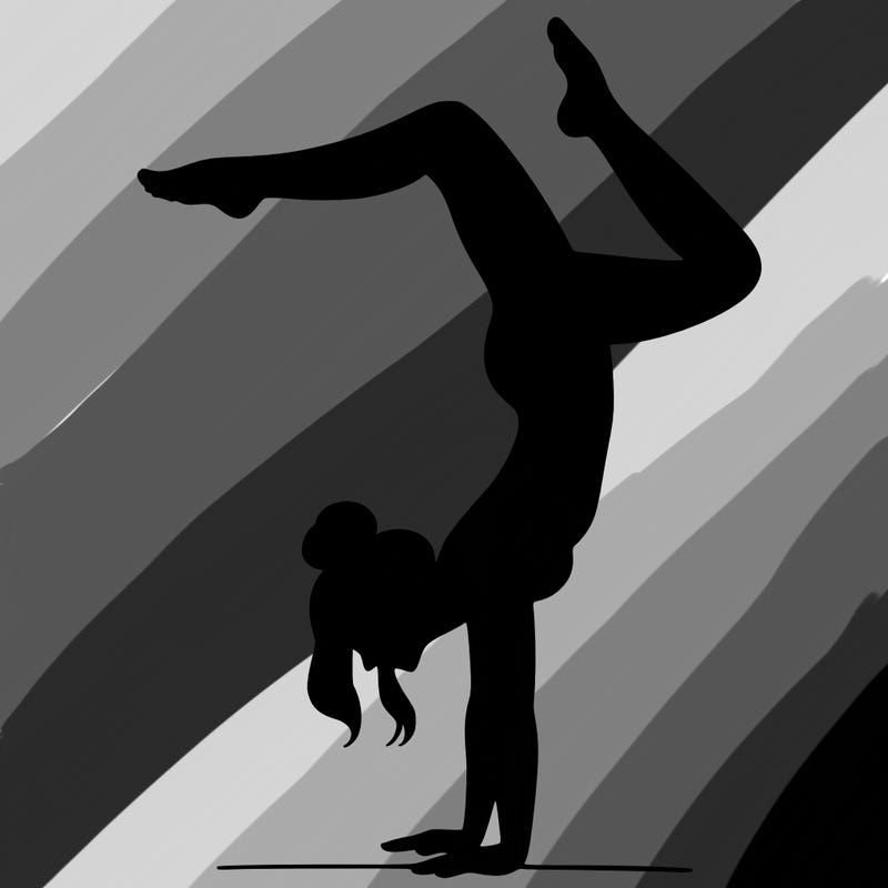 a woman doing a handstand
