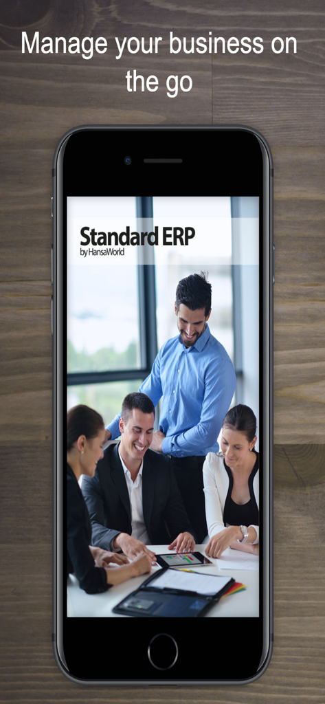 Standard ERP - Smartphone screen showing Standard ERP app by HansaWorld with business professionals collaborating