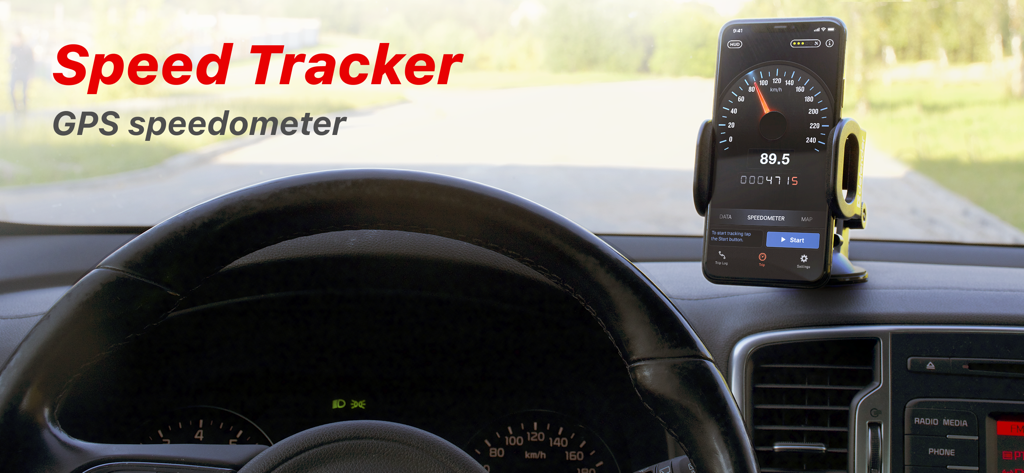 Speed Tracker GPS speedometer app displayed on a smartphone mounted to a car dashboard