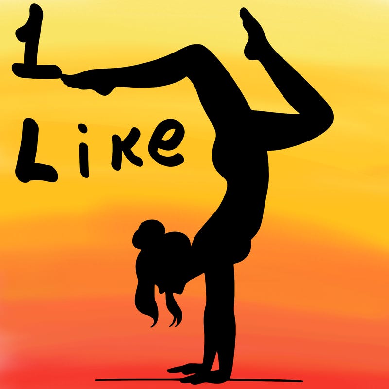 a woman doing a handstand