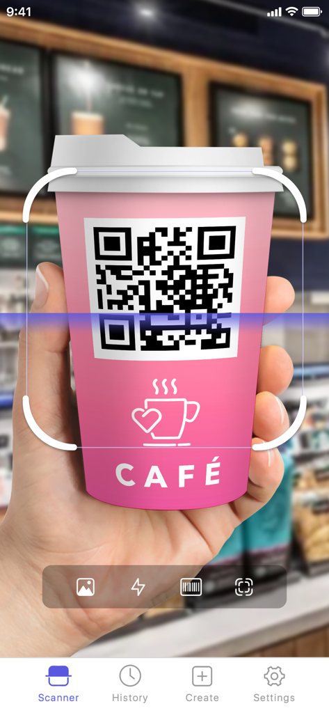 Barcode Scanner QR Code Reader - A hand holding a coffee cup with a QR code being scanned by the mobile application
