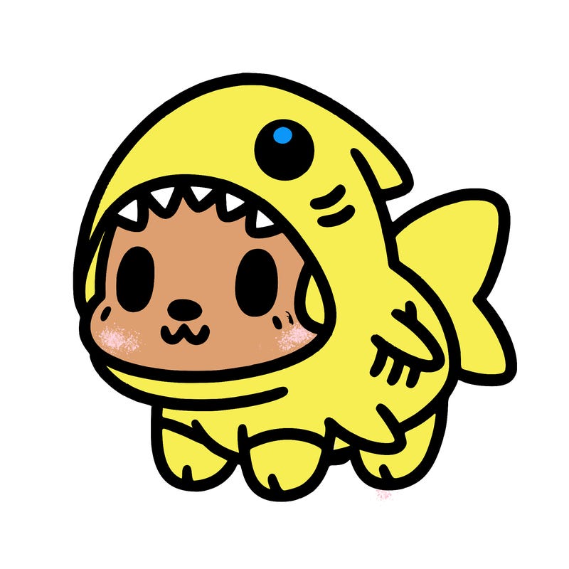 cute dog wearing a shark costume